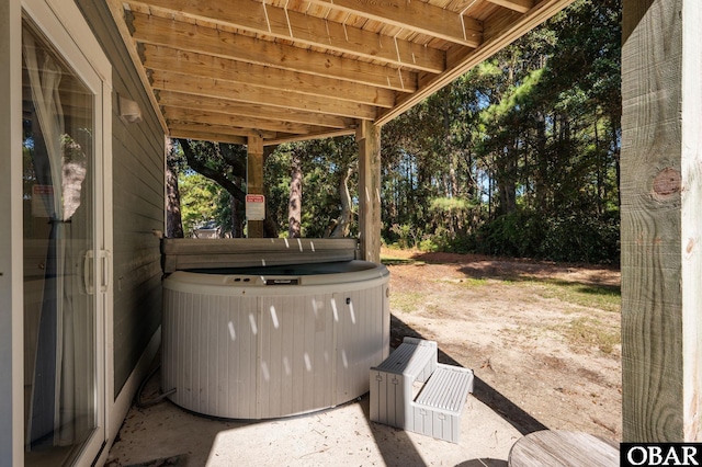 view of patio with a hot tub