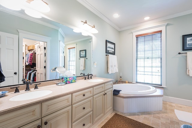 full bathroom with a sink, a healthy amount of sunlight, and ornamental molding