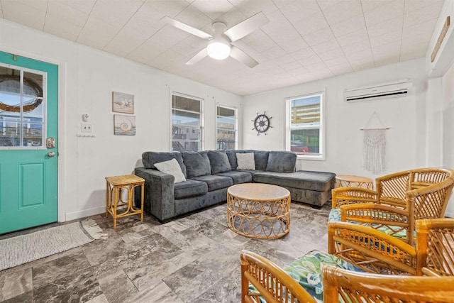 living room featuring a ceiling fan and an AC wall unit