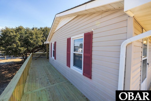 view of side of home featuring a deck