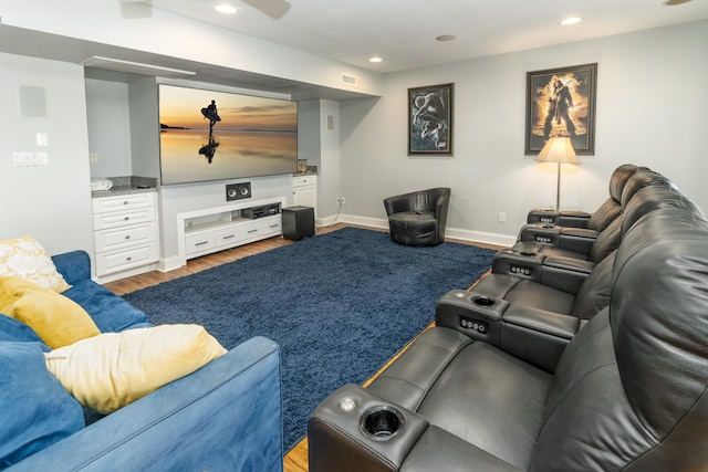 living area with visible vents, recessed lighting, baseboards, and wood finished floors