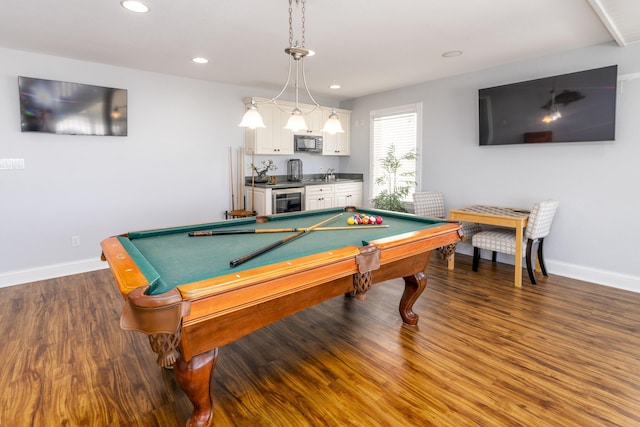 game room featuring recessed lighting, baseboards, beverage cooler, and wood finished floors