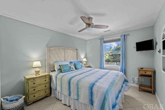 bedroom with light tile patterned floors, ceiling fan, visible vents, baseboards, and crown molding