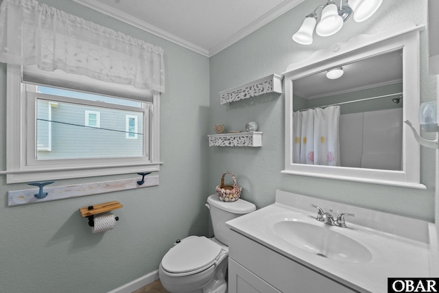 bathroom featuring toilet, ornamental molding, vanity, a shower with curtain, and baseboards