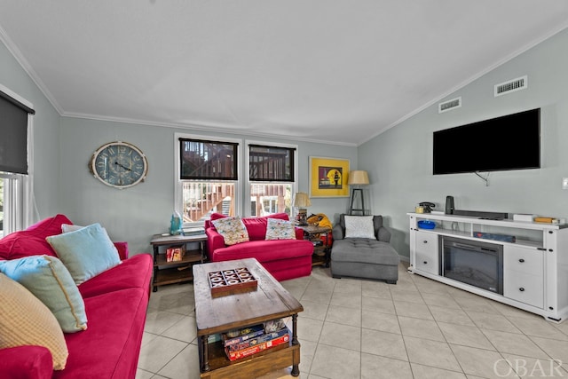 living area with light tile patterned floors, ornamental molding, lofted ceiling, and visible vents