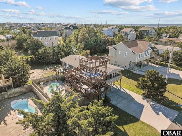 birds eye view of property with a residential view