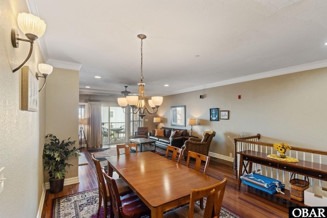 dining area with baseboards, wood finished floors, crown molding, a chandelier, and recessed lighting