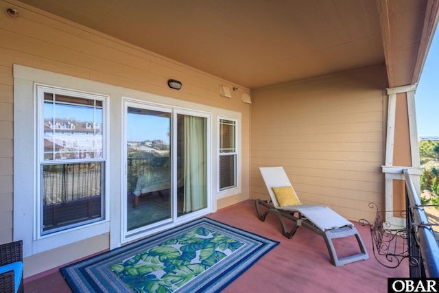 balcony featuring a sunroom