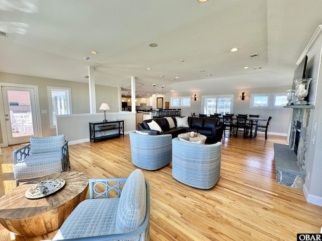 103 Buffell Head Rd Lot 2, Duck, NC 27949 - living area with light wood finished floors, baseboards, a fireplace with raised hearth, and recessed lighting