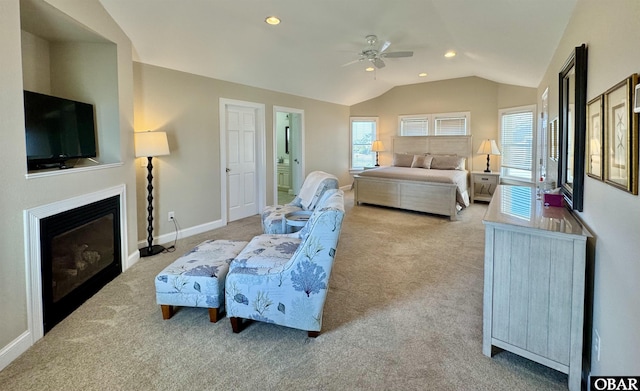 103 Buffell Head Rd Lot 2, Duck, NC 27949 - bedroom featuring carpet floors, lofted ceiling, a glass covered fireplace, recessed lighting, and baseboards