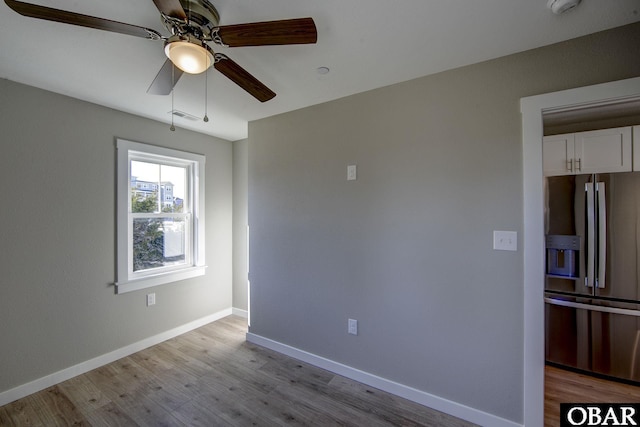 27248 Sand St Lot # 6, Salvo, NC 27972 - spare room featuring ceiling fan, wood finished floors, and a smoke detector