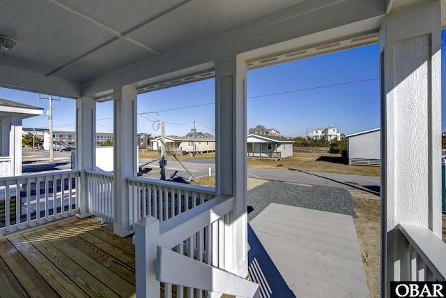 27248 Sand St Lot # 6, Salvo, NC 27972 - sunroom featuring a residential view