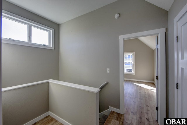 27248 Sand St Lot # 6, Salvo, NC 27972 - hallway with vaulted ceiling, plenty of natural light, wood finished floors, and an upstairs landing