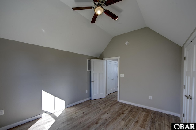 27248 Sand St Lot # 6, Salvo, NC 27972 - unfurnished bedroom with vaulted ceiling, light wood-type flooring, and a ceiling fan