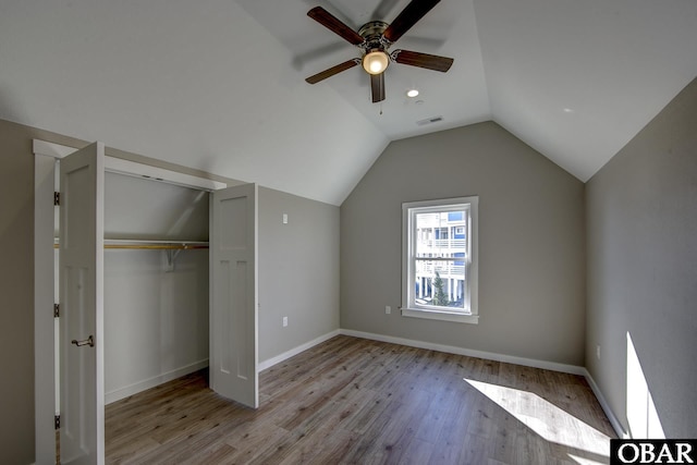 27248 Sand St Lot # 6, Salvo, NC 27972 - unfurnished bedroom featuring wood finished floors, vaulted ceiling, a closet, and ceiling fan
