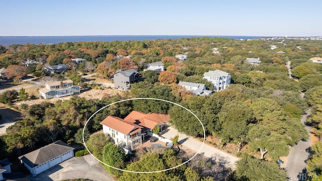 aerial view featuring a residential view and a view of trees