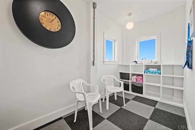 sitting room featuring baseboards