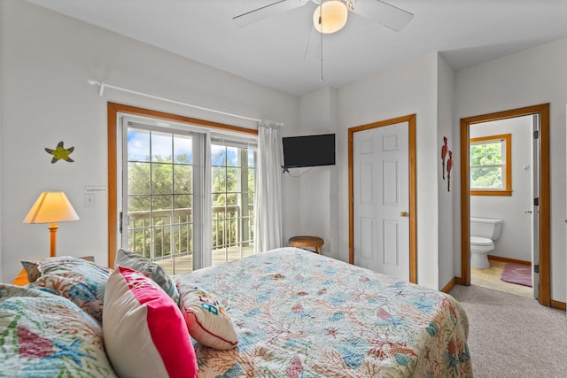 bedroom with baseboards, ceiling fan, access to outside, carpet, and ensuite bath