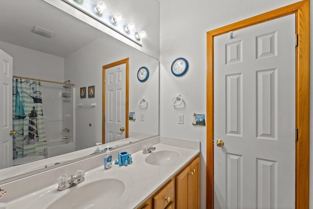 full bathroom featuring double vanity, a sink, and shower / bathtub combination with curtain
