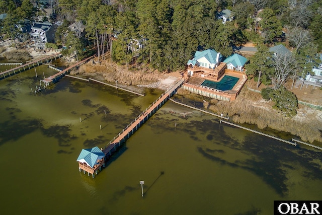 birds eye view of property featuring a water view