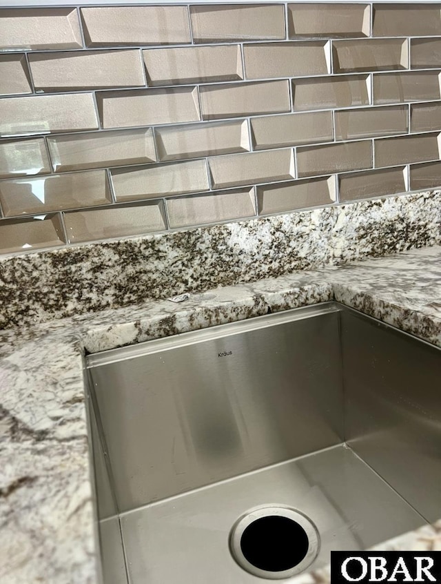 interior details featuring light stone countertops