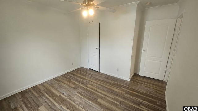 unfurnished bedroom with baseboards, wood finished floors, ornamental molding, and ceiling fan