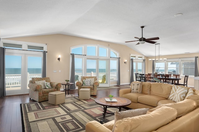 151 Buffell Head Rd Lot 179, Duck, NC 27949 - living room with lofted ceiling, hardwood / wood-style flooring, a ceiling fan, a water view, and a textured ceiling