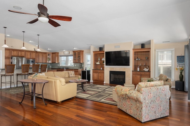 151 Buffell Head Rd Lot 179, Duck, NC 27949 - living area featuring ceiling fan, dark wood-type flooring, lofted ceiling, healthy amount of natural light, and a fireplace