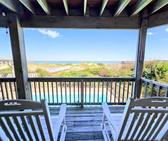 deck with a fenced in pool