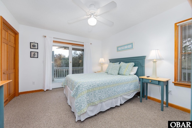 bedroom featuring access to exterior, light colored carpet, ceiling fan, and baseboards