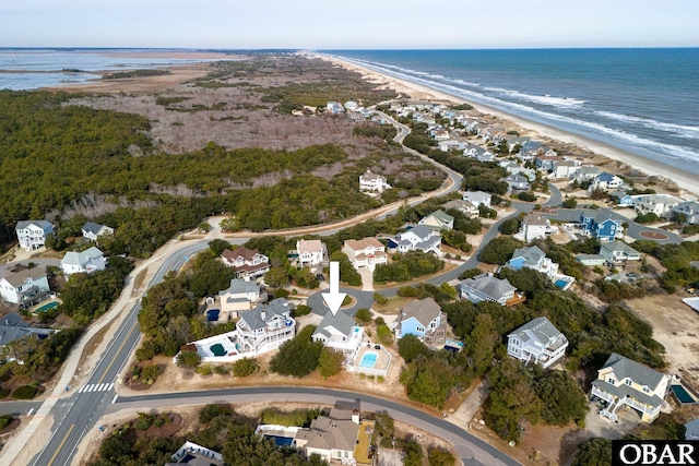 bird's eye view featuring a residential view and a water view