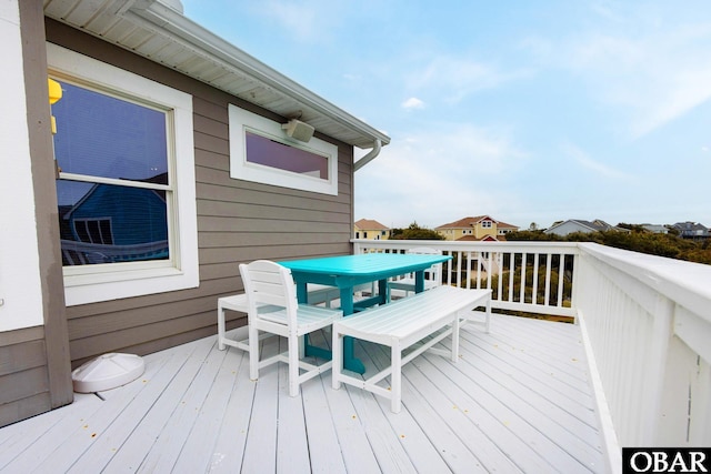 deck with outdoor dining space