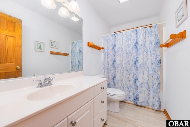 bathroom featuring shower / bathtub combination with curtain, toilet, an inviting chandelier, vanity, and tile patterned floors