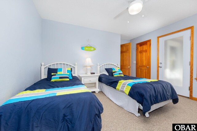 bedroom featuring carpet floors and a ceiling fan