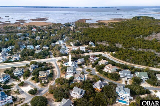 bird's eye view with a water view and a residential view