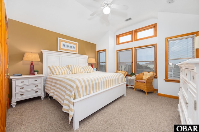 bedroom with light colored carpet, visible vents, vaulted ceiling, ceiling fan, and baseboards