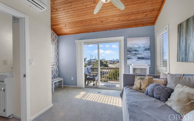 25056 Sea Vista Ct Lot 29, Waves, NC 27982 - living area with vaulted ceiling, carpet floors, wooden ceiling, and baseboards