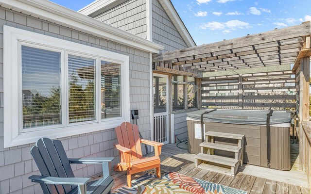 25056 Sea Vista Ct Lot 29, Waves, NC 27982 - wooden terrace featuring a hot tub and a pergola