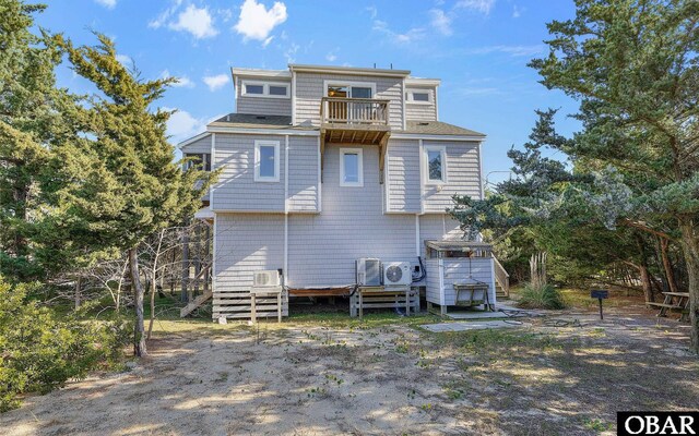 25056 Sea Vista Ct Lot 29, Waves, NC 27982 - rear view of house featuring a balcony