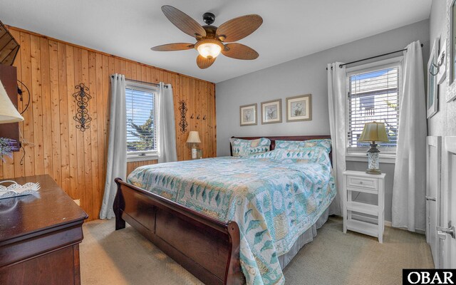 25056 Sea Vista Ct Lot 29, Waves, NC 27982 - bedroom featuring light colored carpet, wooden walls, and multiple windows