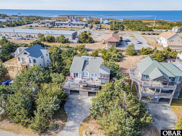 bird's eye view featuring a residential view and a water view