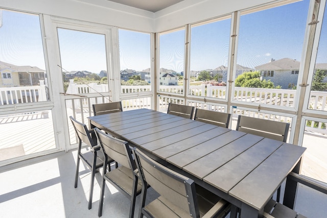 1229 Ocean Hill Ct Lot 120, Corolla, NC 27927 - sunroom / solarium featuring outdoor dining area, plenty of natural light, and a residential view