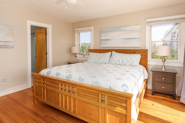 1229 Ocean Hill Ct Lot 120, Corolla, NC 27927 - bedroom featuring light wood-style floors, baseboards, and a ceiling fan
