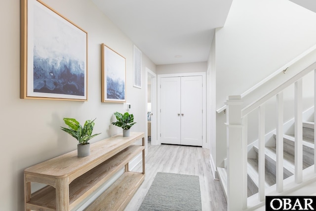 2267 Sandpiper Rd Lot 29, Corolla, NC 27927 - foyer entrance with light wood-style flooring and stairs
