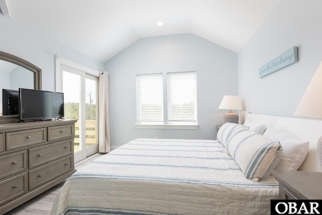 2267 Sandpiper Rd Lot 29, Corolla, NC 27927 - bedroom featuring vaulted ceiling, access to exterior, and light wood-type flooring