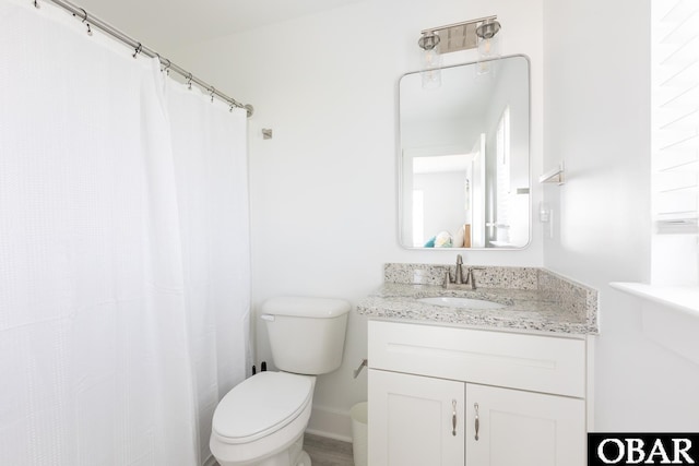 2267 Sandpiper Rd Lot 29, Corolla, NC 27927 - full bathroom featuring vanity, toilet, baseboards, and a shower with curtain