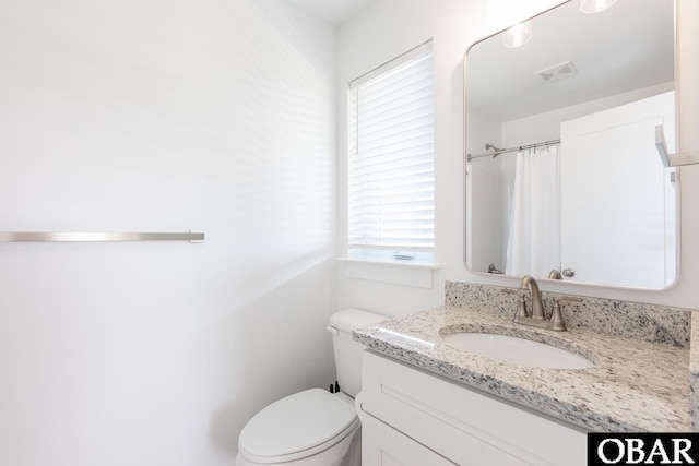 2267 Sandpiper Rd Lot 29, Corolla, NC 27927 - bathroom featuring vanity, toilet, and a shower with curtain