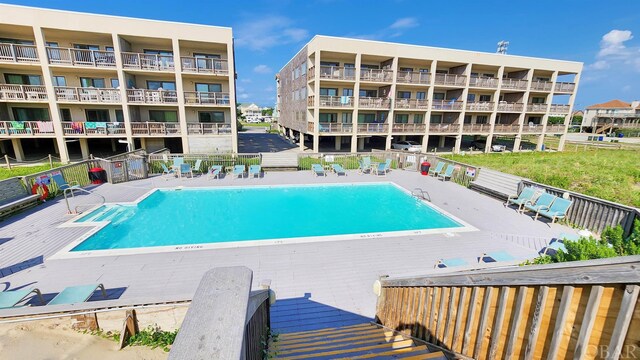 community pool with fence