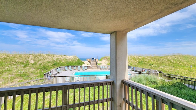5507 S Virginia Dare Trl Unit 101B, Nags Head, NC 27959 - balcony featuring view of pool