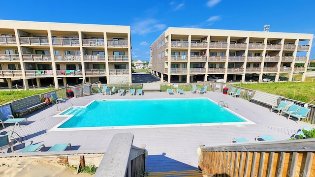 pool featuring a patio area